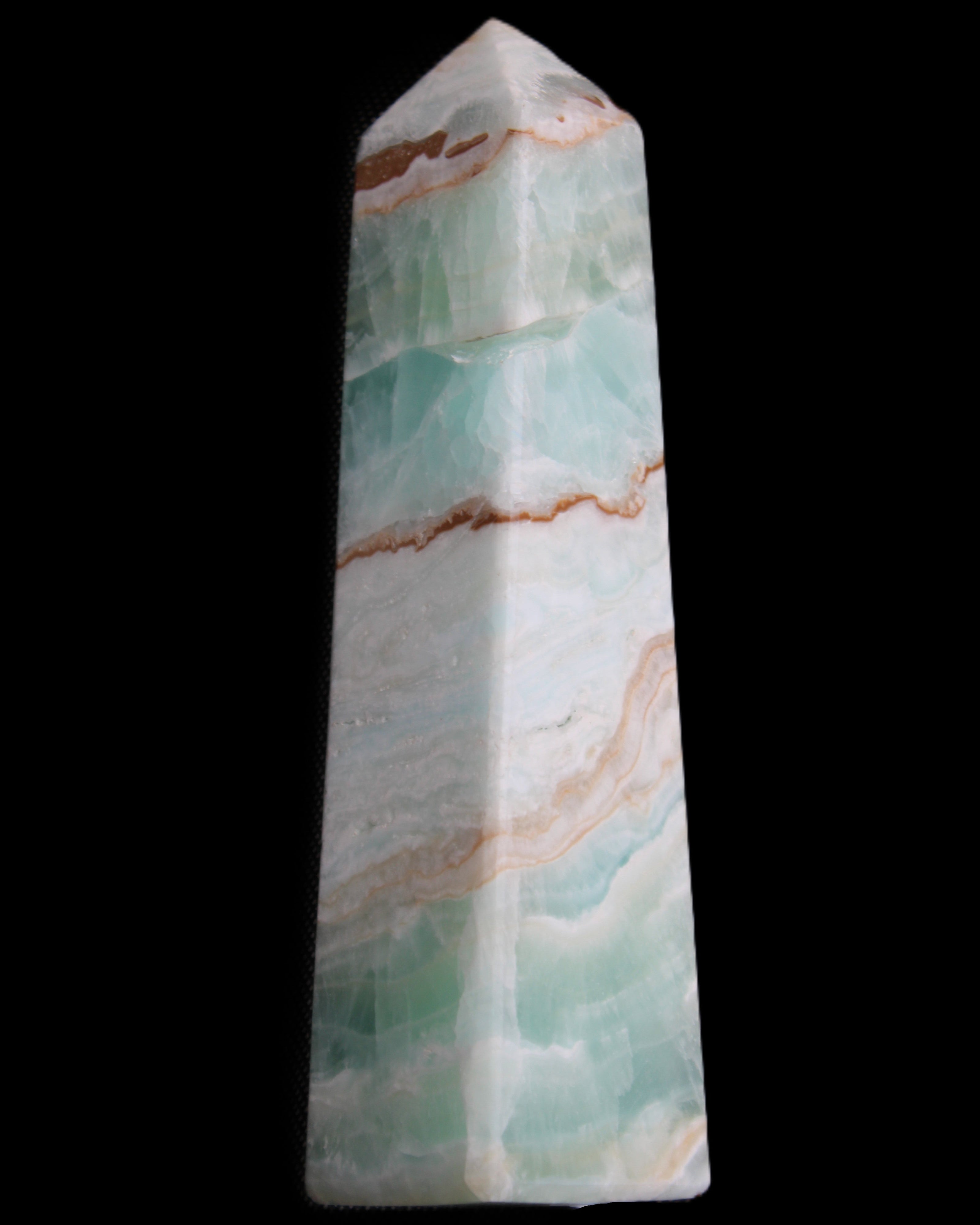 Pistachio Calcite obelisk 155mm 465g in sunlight - Rocks and Things Store