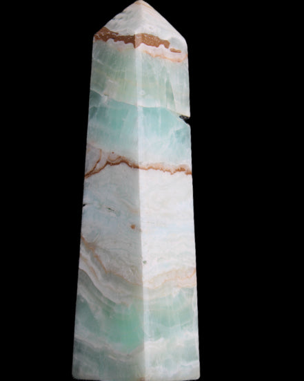 Pistachio Calcite obelisk 155mm 465g in sunlight - Rocks and Things Store