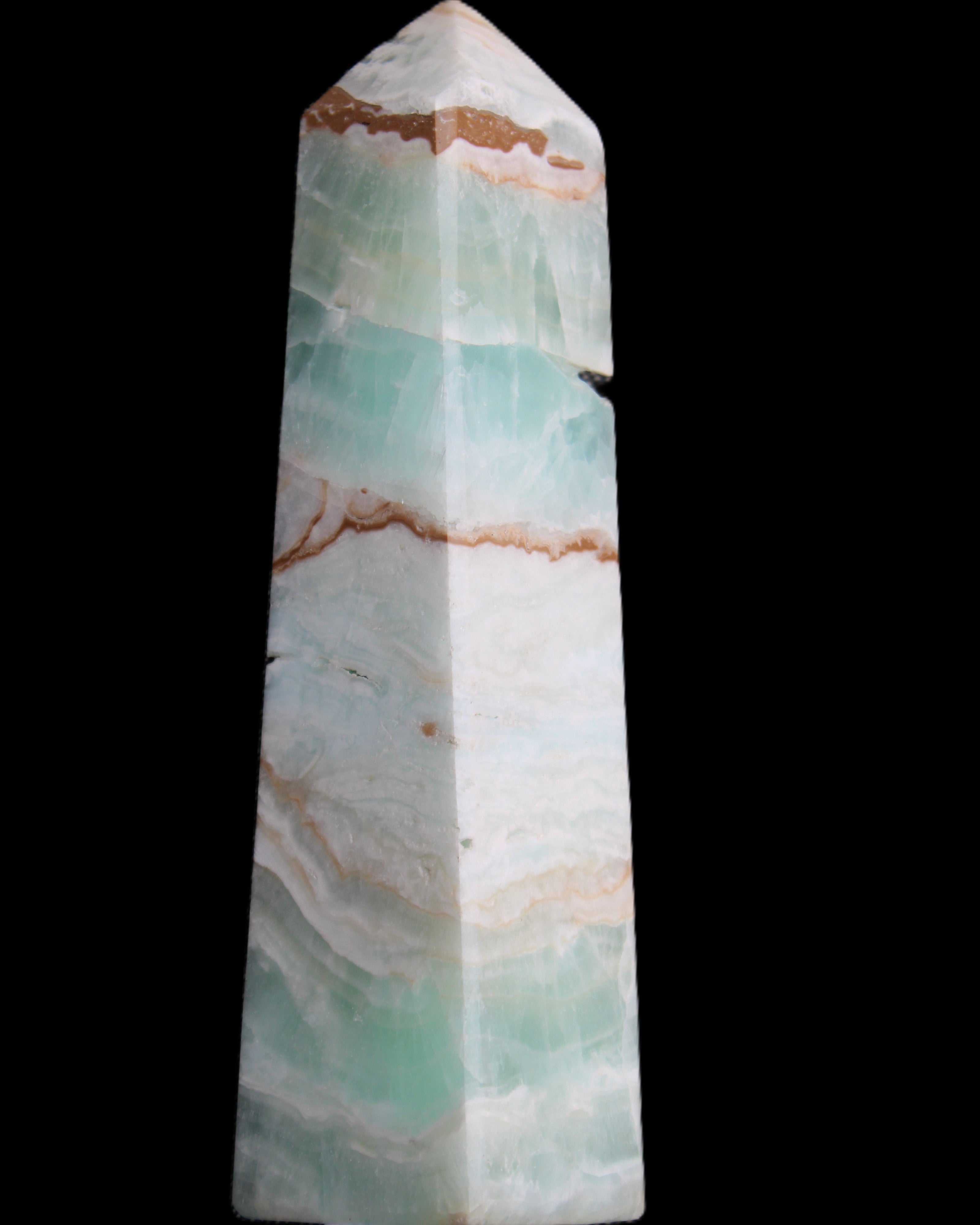 Pistachio Calcite obelisk 155mm 465g in sunlight - Rocks and Things Store