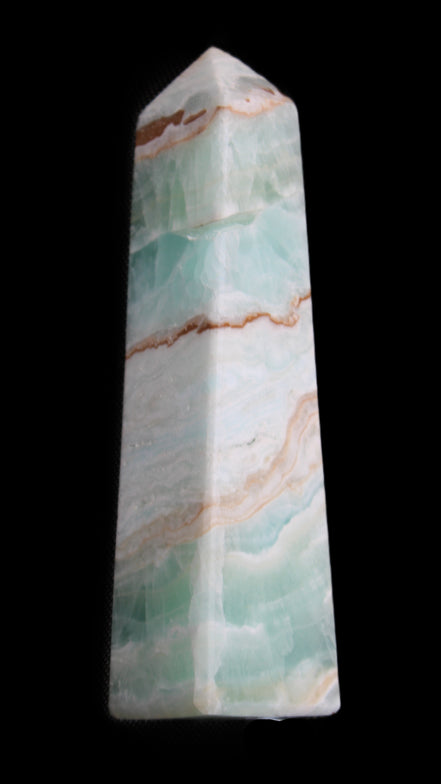 Pistachio Calcite obelisk 155mm 465g in sunlight - Rocks and Things Store
