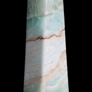 Pistachio Calcite obelisk 155mm 465g in sunlight - Rocks and Things Store