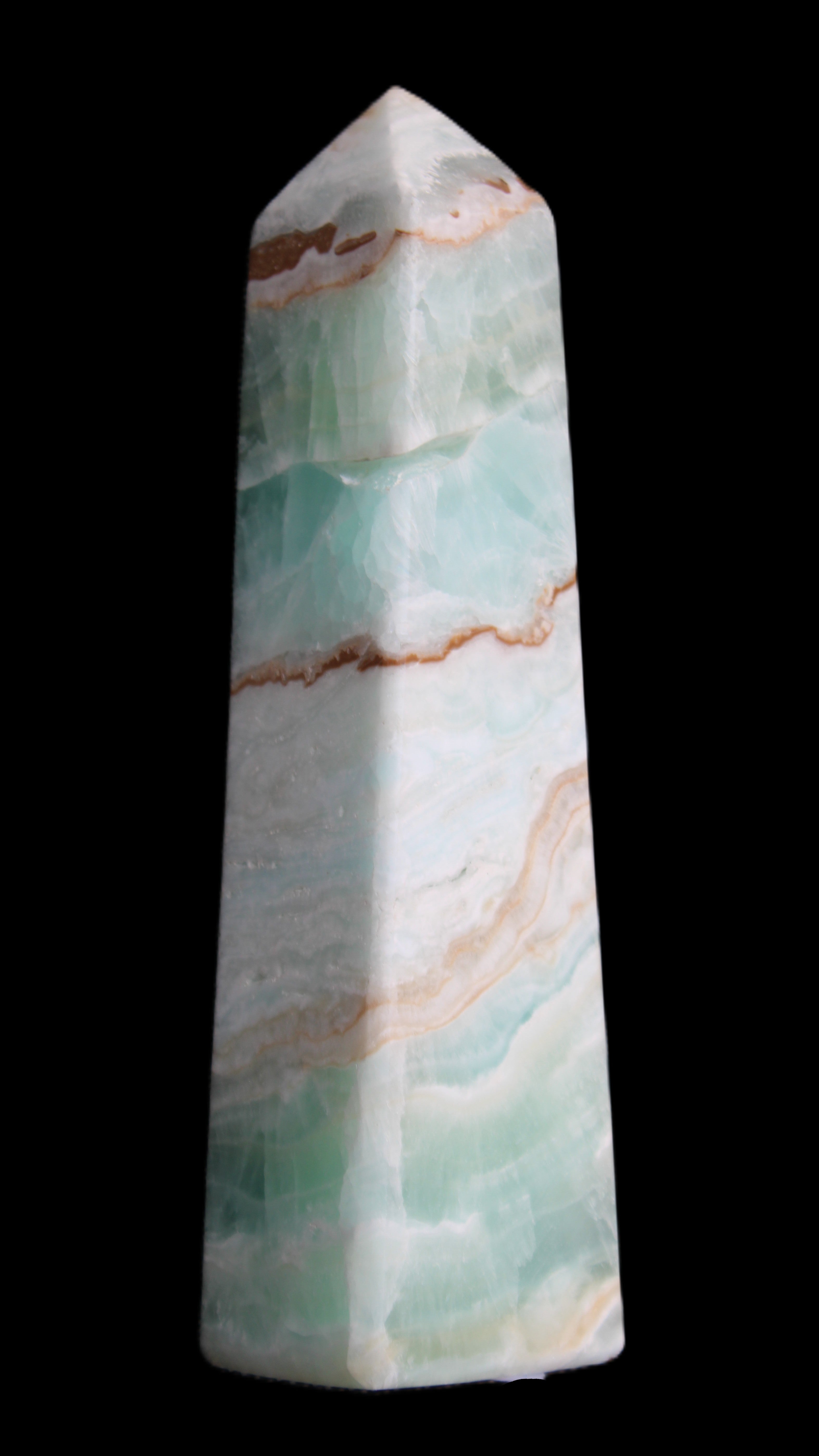 Pistachio Calcite obelisk 155mm 465g in sunlight - Rocks and Things Store