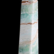 Pistachio Calcite obelisk 155mm 465g in sunlight - Rocks and Things Store