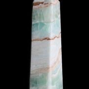 Pistachio Calcite obelisk 155mm 465g in sunlight - Rocks and Things Store