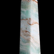Pistachio Calcite obelisk 155mm 465g in sunlight - Rocks and Things Store
