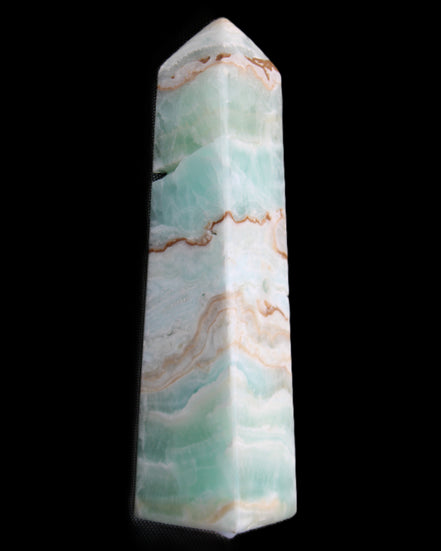 Pistachio Calcite obelisk 155mm 465g in sunlight - Rocks and Things Store