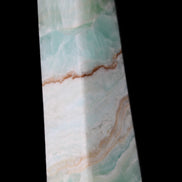 Pistachio Calcite obelisk 155mm 465g in sunlight - Rocks and Things Store