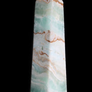 Pistachio Calcite obelisk 155mm 465g in sunlight - Rocks and Things Store