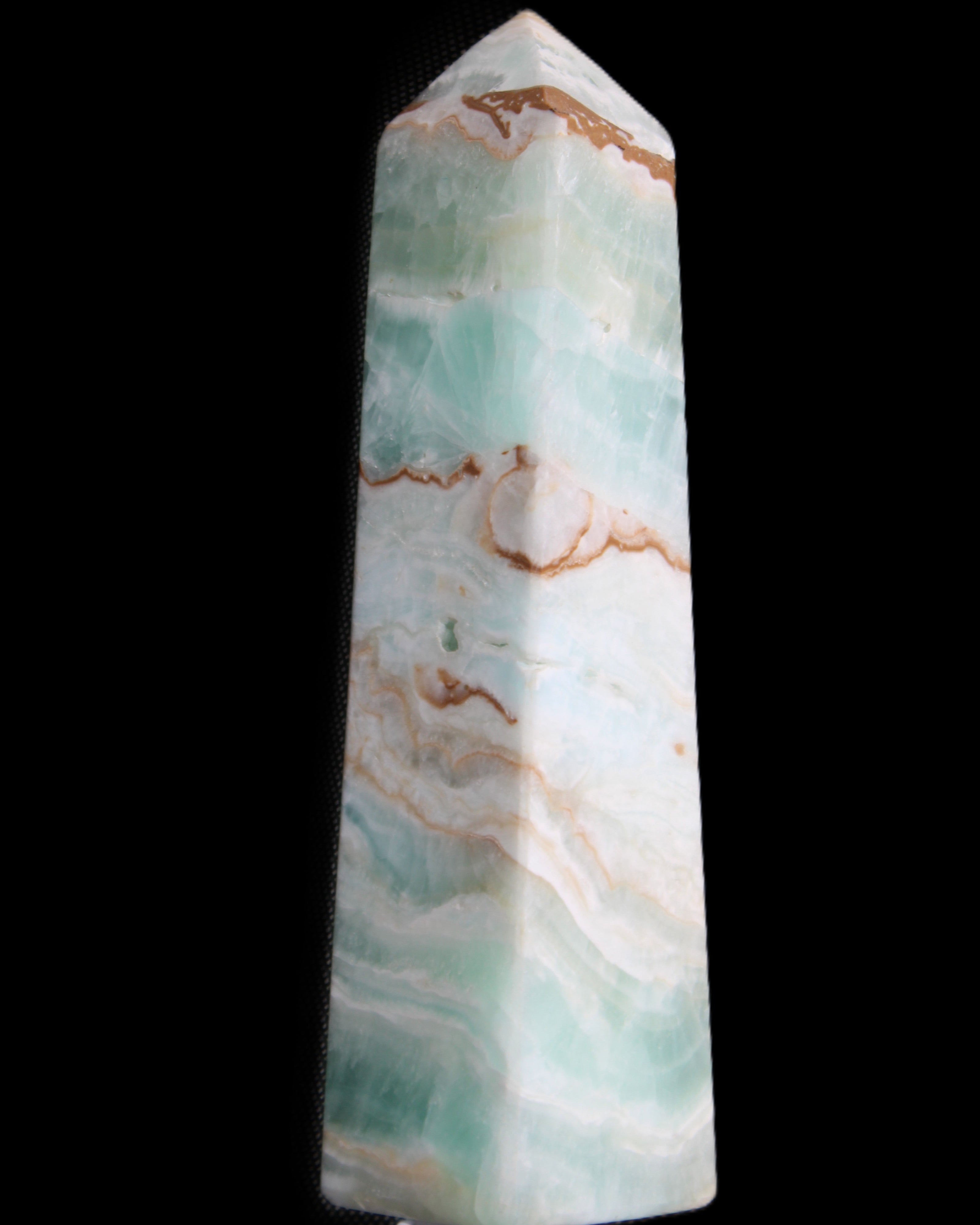 Pistachio Calcite obelisk 155mm 465g in sunlight - Rocks and Things Store