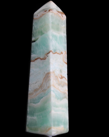 Pistachio Calcite obelisk 155mm 465g in sunlight - Rocks and Things Store