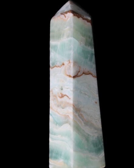 Pistachio Calcite obelisk 155mm 465g in sunlight - Rocks and Things Store