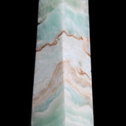 Pistachio Calcite obelisk 155mm 465g in sunlight - Rocks and Things Store