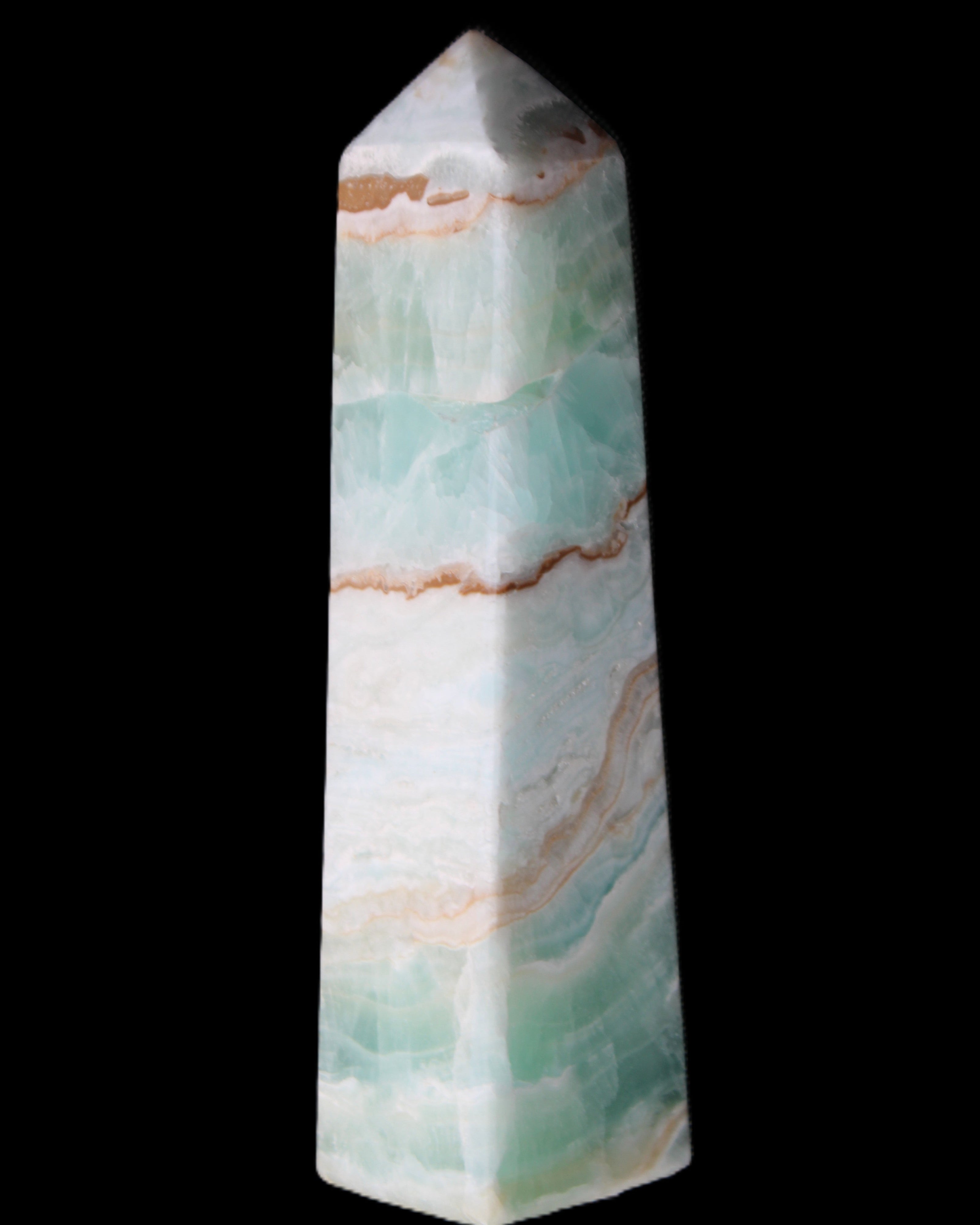 Pistachio Calcite obelisk 155mm 465g in sunlight - Rocks and Things Store