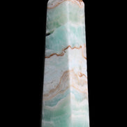 Pistachio Calcite obelisk 155mm 465g in sunlight - Rocks and Things Store
