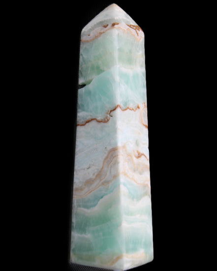 Pistachio Calcite obelisk 155mm 465g in sunlight - Rocks and Things Store