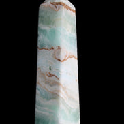 Pistachio Calcite obelisk 155mm 465g in sunlight - Rocks and Things Store