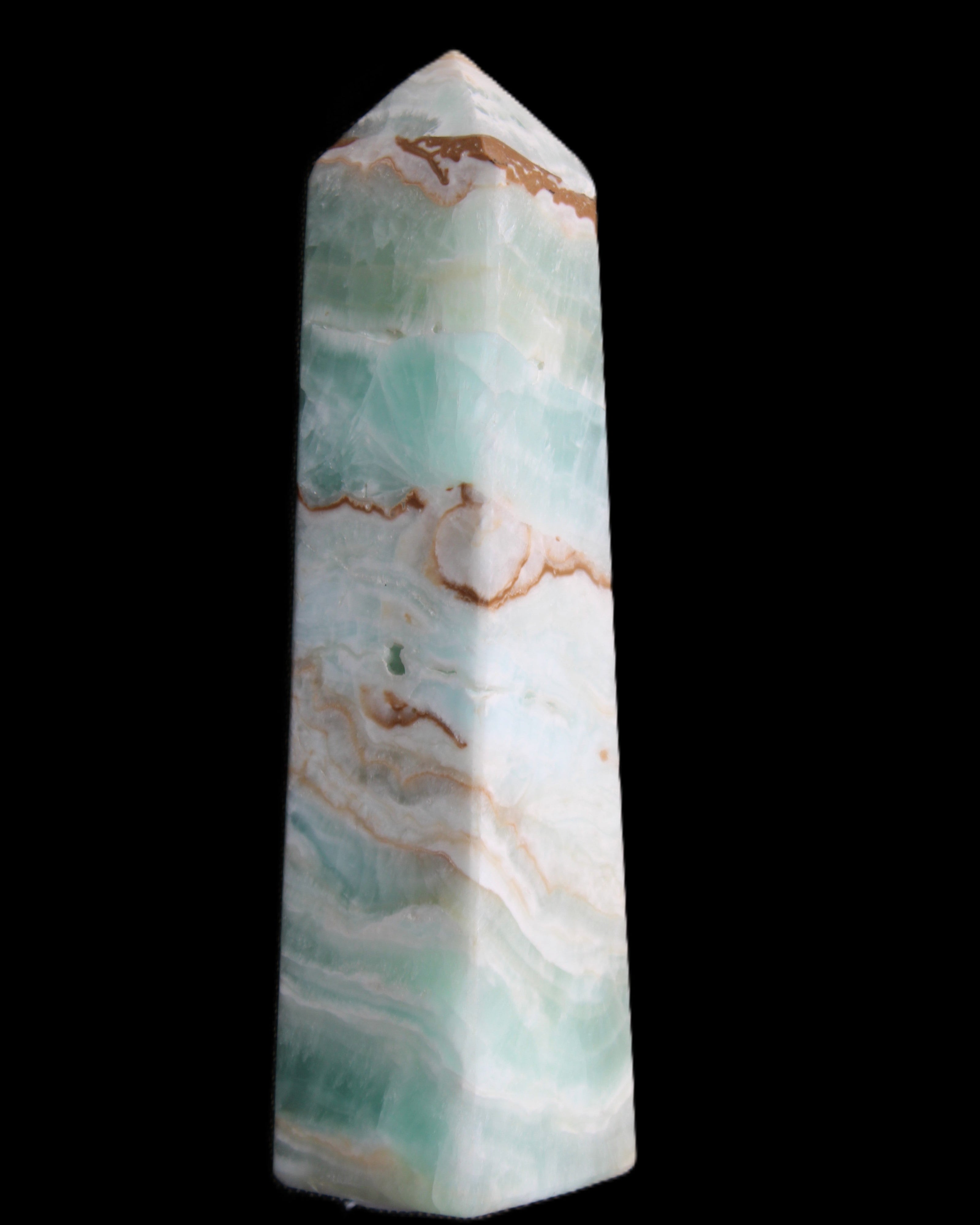 Pistachio Calcite obelisk 155mm 465g in sunlight - Rocks and Things Store