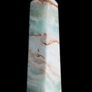 Pistachio Calcite obelisk 155mm 465g in sunlight - Rocks and Things Store