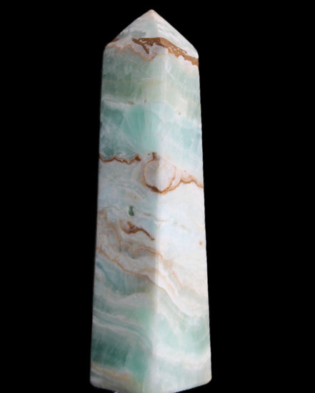 Pistachio Calcite obelisk 155mm 465g in sunlight - Rocks and Things Store