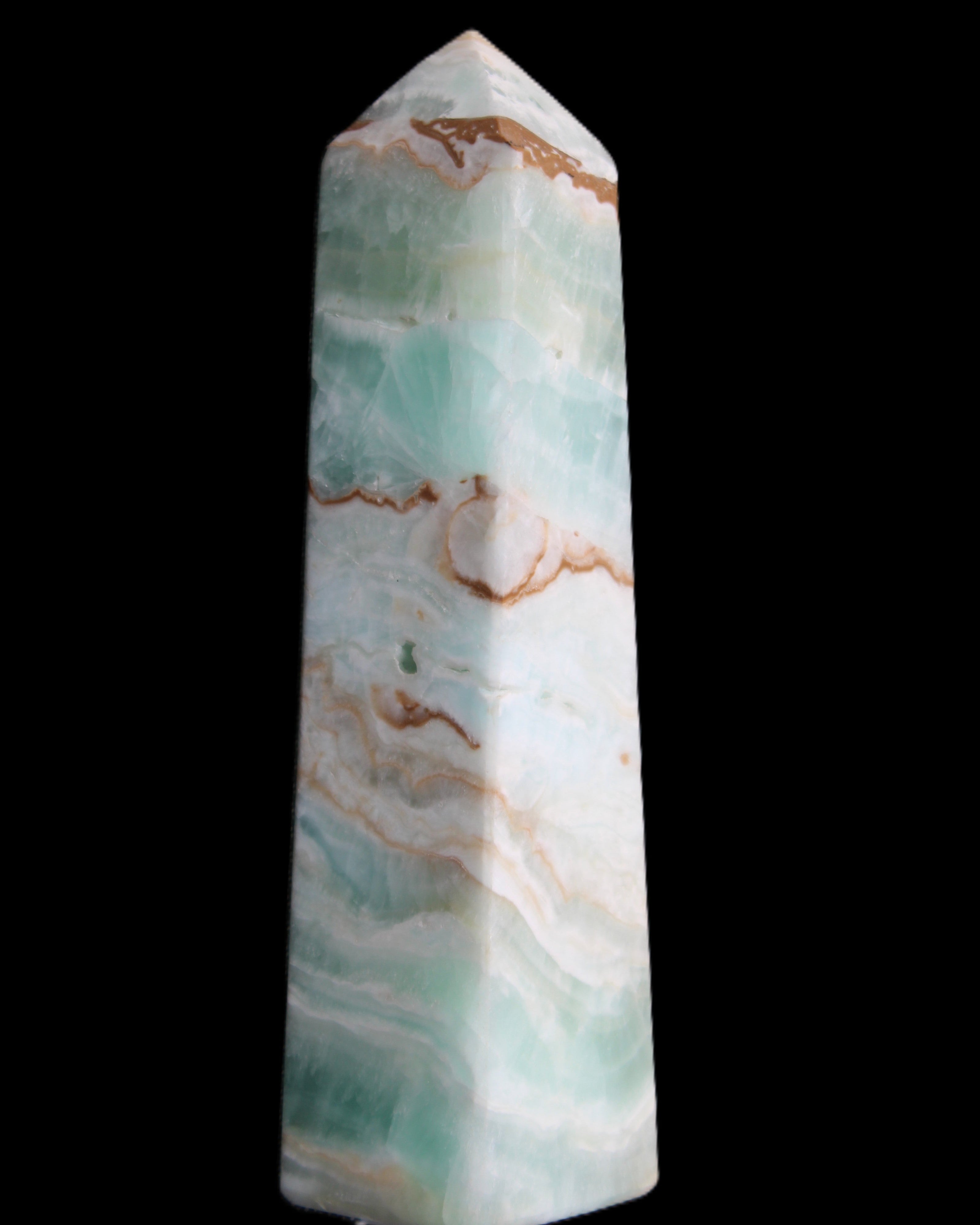 Pistachio Calcite obelisk 155mm 465g in sunlight - Rocks and Things Store