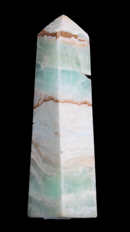 Pistachio Calcite obelisk 155mm 465g in sunlight - Rocks and Things Store