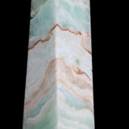 Pistachio Calcite obelisk 155mm 465g in sunlight - Rocks and Things Store