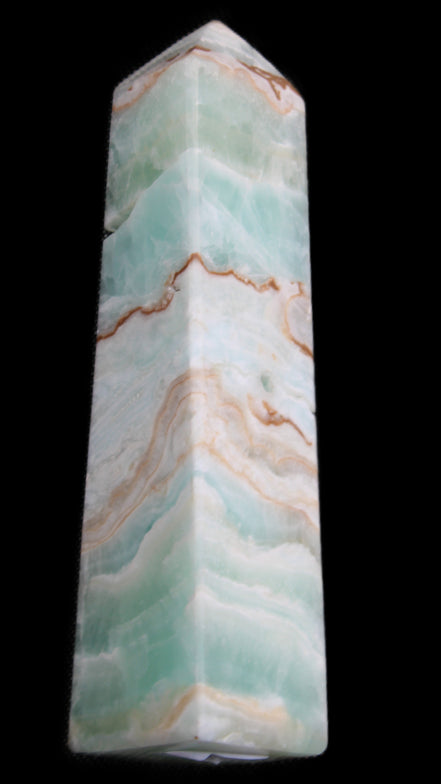 Pistachio Calcite obelisk 155mm 465g in sunlight - Rocks and Things Store