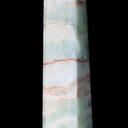 Pistachio Calcite obelisk 140mm 362g in sunlight - Rocks and Things Store