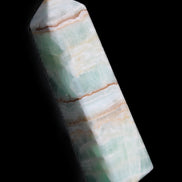 Pistachio Calcite obelisk 140mm 362g in sunlight - Rocks and Things Store