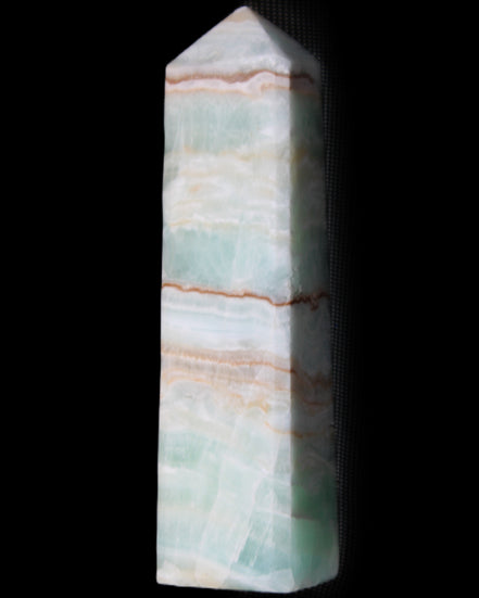 Pistachio Calcite obelisk 140mm 362g in sunlight - Rocks and Things Store