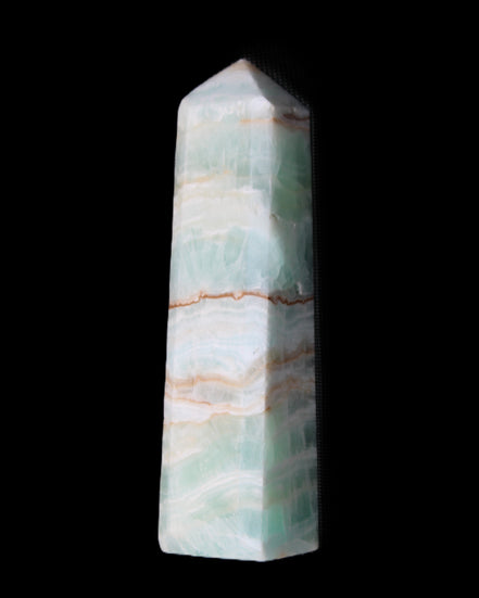 Pistachio Calcite obelisk 140mm 362g in sunlight - Rocks and Things Store