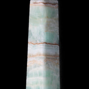 Pistachio Calcite obelisk 140mm 362g in sunlight - Rocks and Things Store