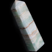 Pistachio Calcite obelisk 140mm 362g in sunlight - Rocks and Things Store