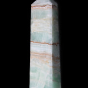 Pistachio Calcite obelisk 140mm 362g in sunlight - Rocks and Things Store