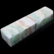 Pistachio Calcite obelisk 140mm 362g in sunlight - Rocks and Things Store