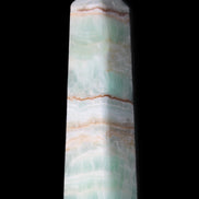 Pistachio Calcite obelisk 140mm 362g in sunlight - Rocks and Things Store