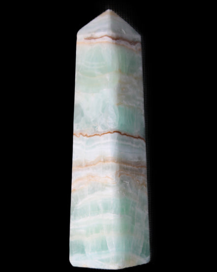 Pistachio Calcite obelisk 140mm 362g in sunlight - Rocks and Things Store