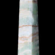Pistachio Calcite obelisk 140mm 362g in sunlight - Rocks and Things Store