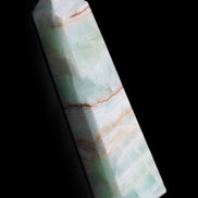 Pistachio Calcite obelisk 140mm 362g in sunlight - Rocks and Things Store