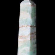 Pistachio Calcite obelisk 140mm 362g in sunlight - Rocks and Things Store