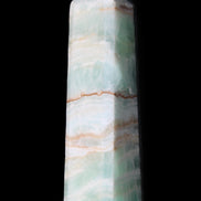 Pistachio Calcite obelisk 140mm 362g in sunlight - Rocks and Things Store
