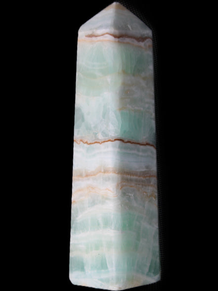 Pistachio Calcite obelisk 140mm 362g in sunlight - Rocks and Things Store