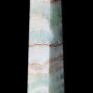 Pistachio Calcite obelisk 140mm 362g in sunlight - Rocks and Things Store