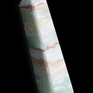 Pistachio Calcite obelisk 140mm 362g in sunlight - Rocks and Things Store