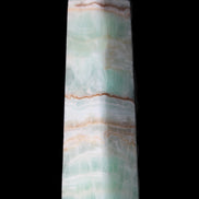 Pistachio Calcite obelisk 140mm 362g in sunlight - Rocks and Things Store