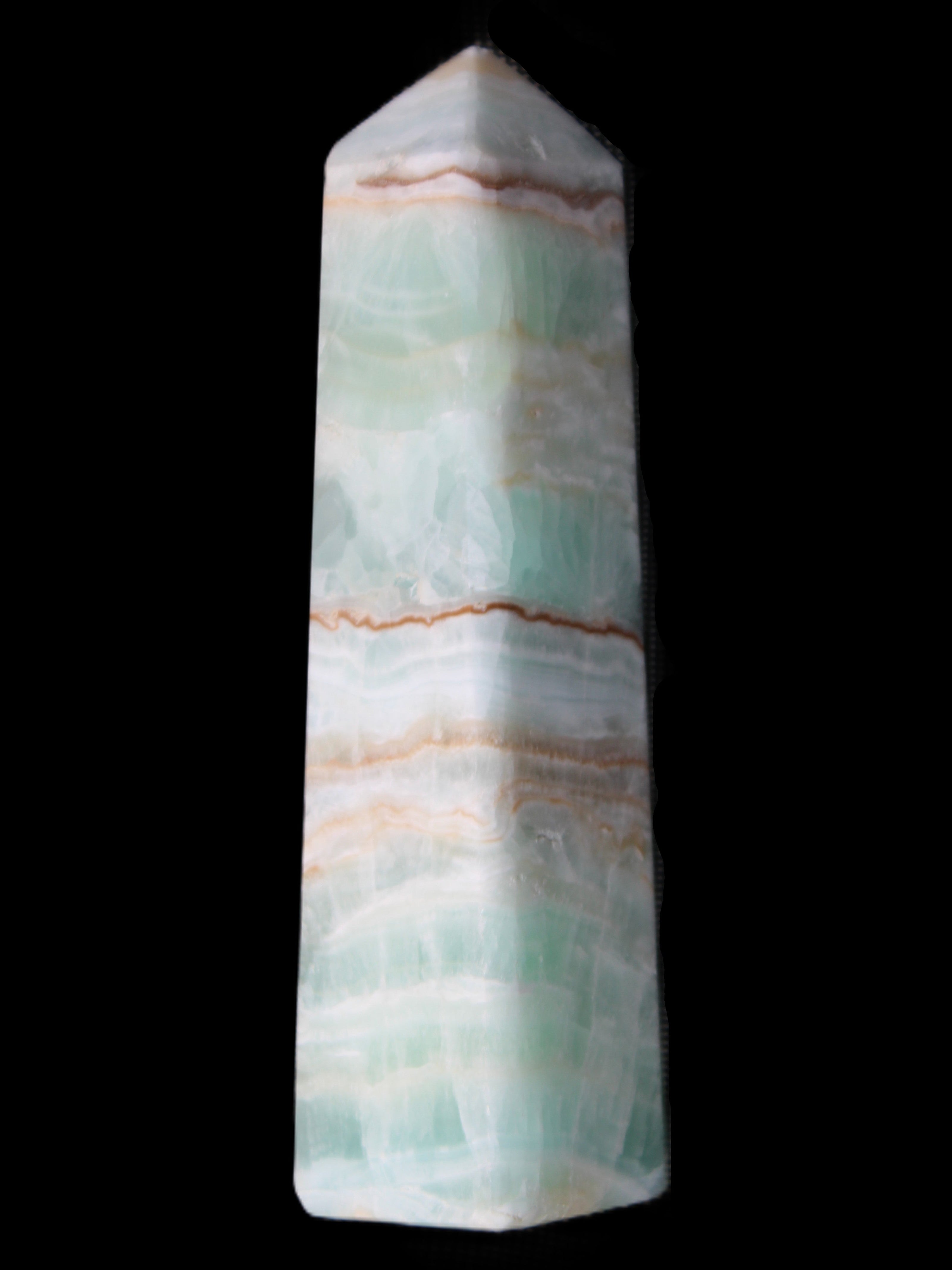 Pistachio Calcite obelisk 140mm 362g in sunlight - Rocks and Things Store