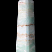 Pistachio Calcite obelisk 140mm 362g in sunlight - Rocks and Things Store
