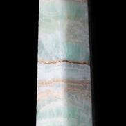 Pistachio Calcite obelisk 140mm 362g in sunlight - Rocks and Things Store