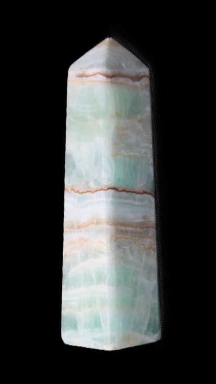 Pistachio Calcite obelisk 140mm 362g in sunlight - Rocks and Things Store