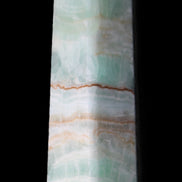 Pistachio Calcite obelisk 140mm 362g in sunlight - Rocks and Things Store
